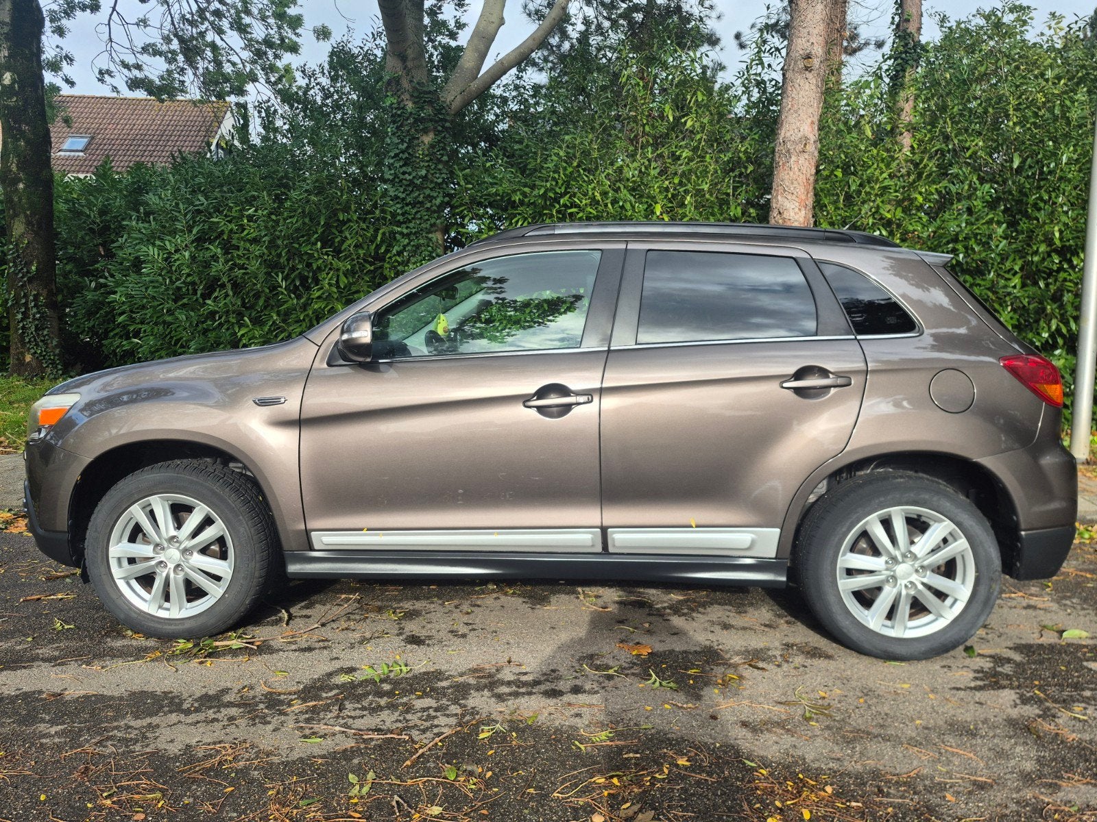 Mitsubishi ASX 1.6 86KW 2010 Bruin, Auto's, Voorwielaandrijving, Euro 5, Stof, Zwart