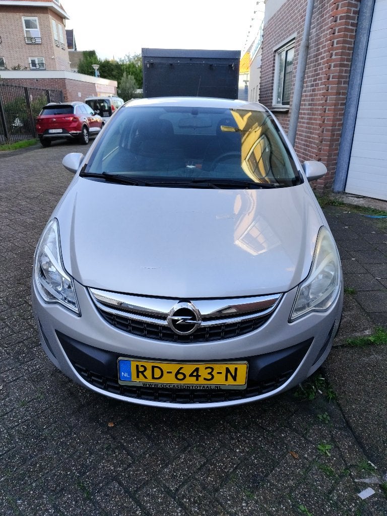 Opel Corsa 1.2 16V 3D 2011 Grijs, Auto's, Voorwielaandrijving, 40 €/maand, 1229 cc, Handgeschakeld