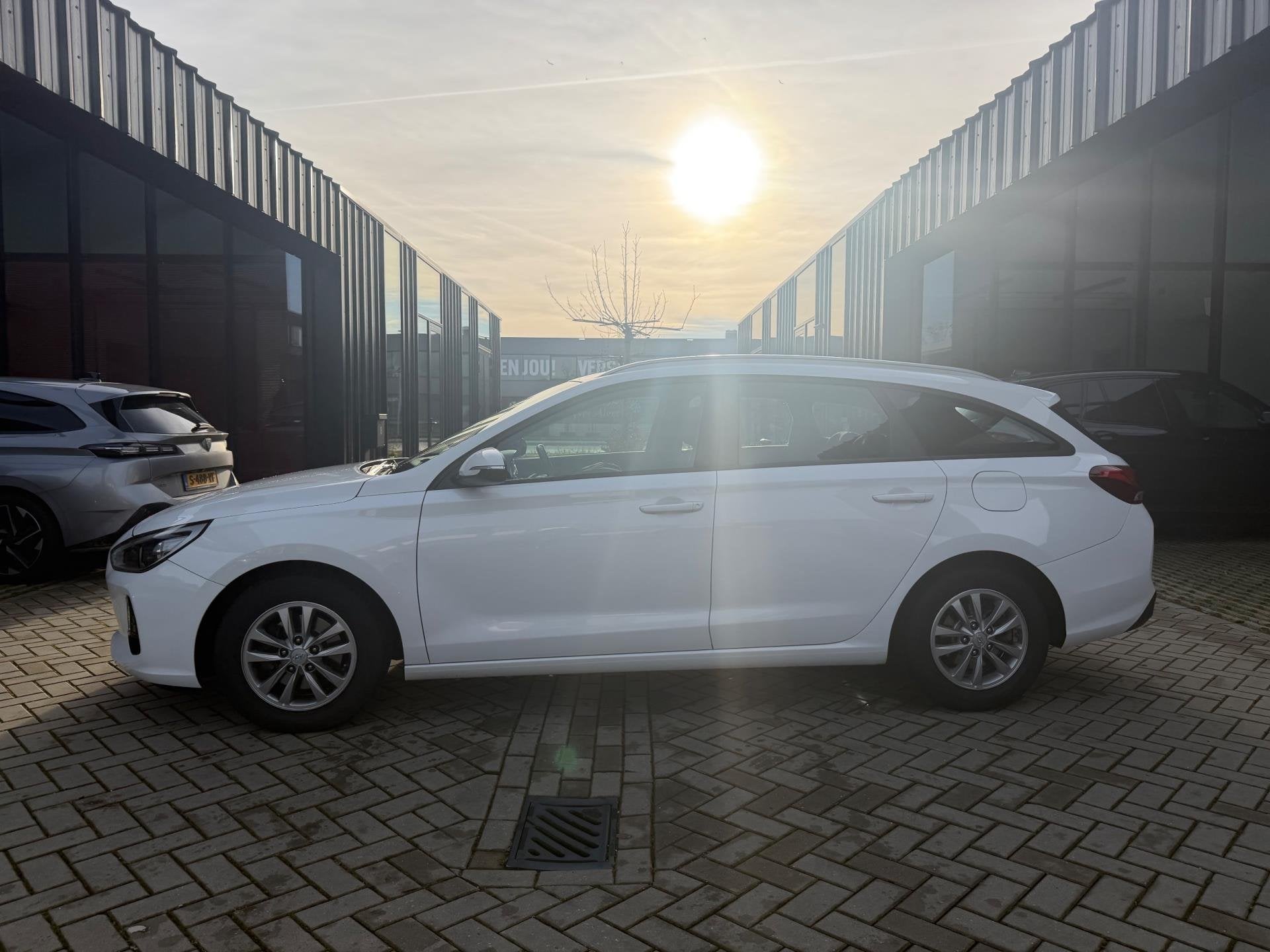 Hyundai I30 Wagon 1.0 T-GDI Comfort Cruise PDC Nwe APK, Auto's, Hyundai, Voorwielaandrijving, Stof, Gebruikt, Wit