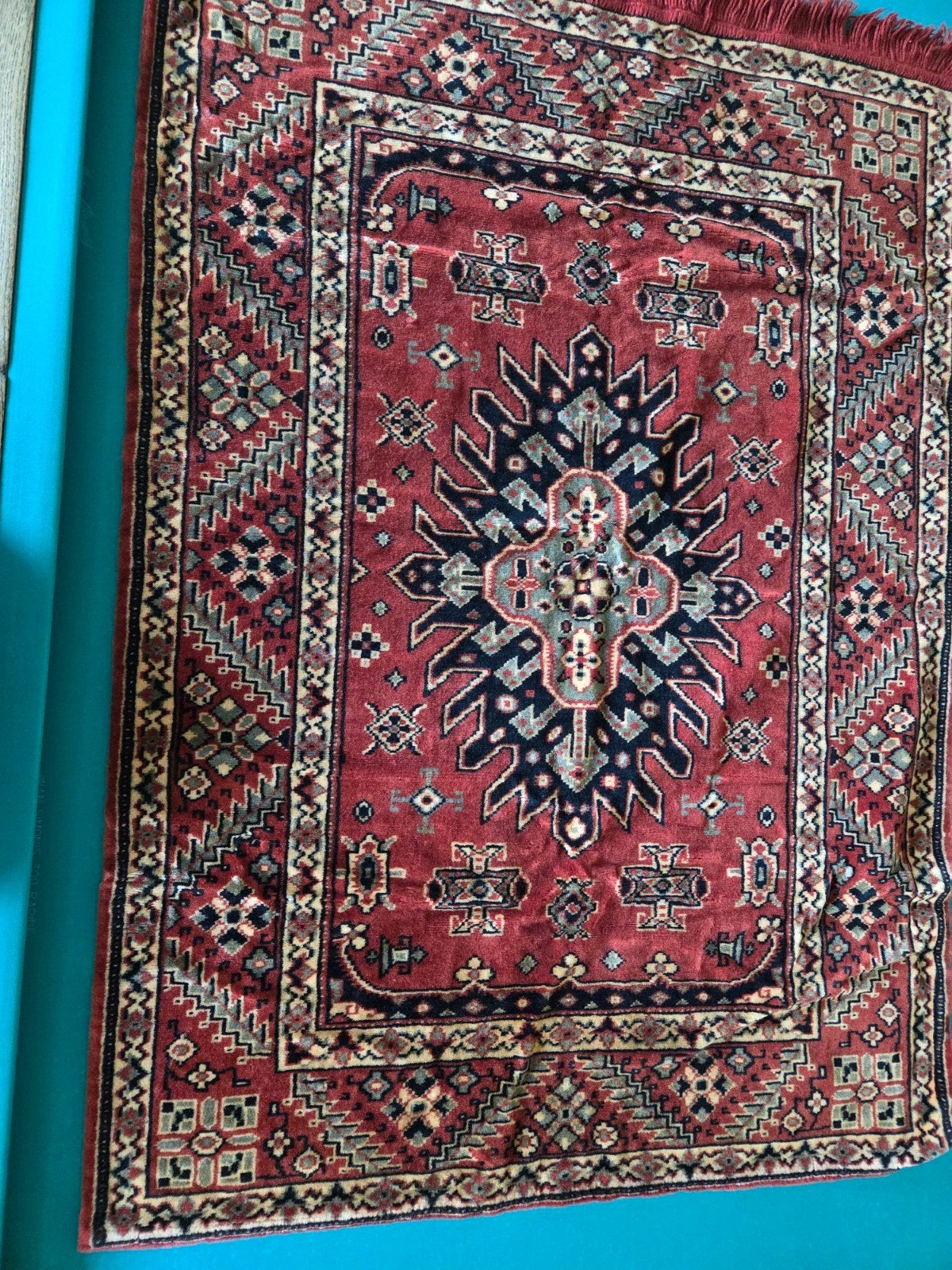 Antieke kapstok wandkleed, Ophalen