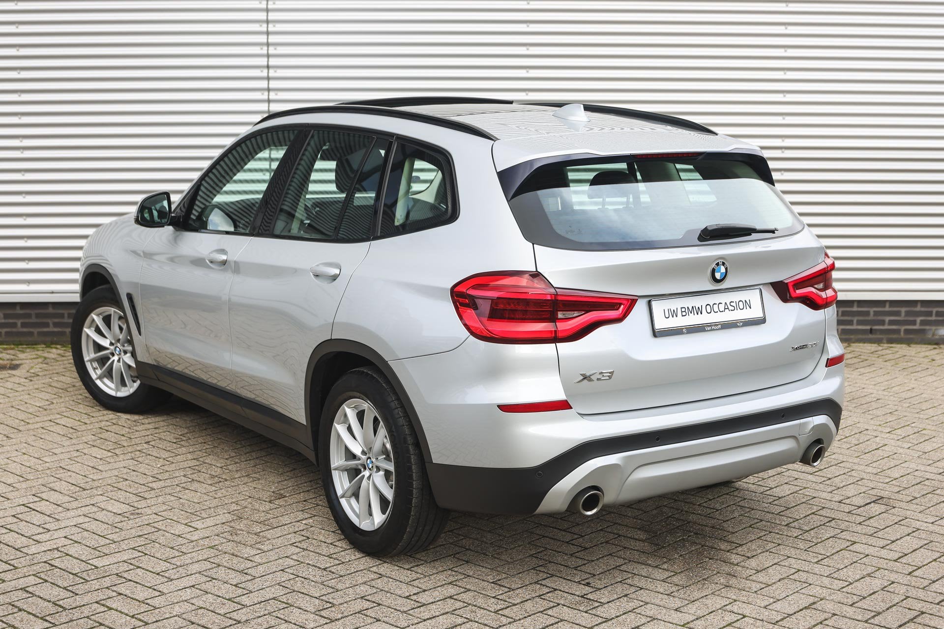 BMW X3 xDrive20i Automaat / Panoramadak / Trekhaak / Sportst, Auto's, Gebruikt, Euro 6, 4 cilinders, Leder en Stof