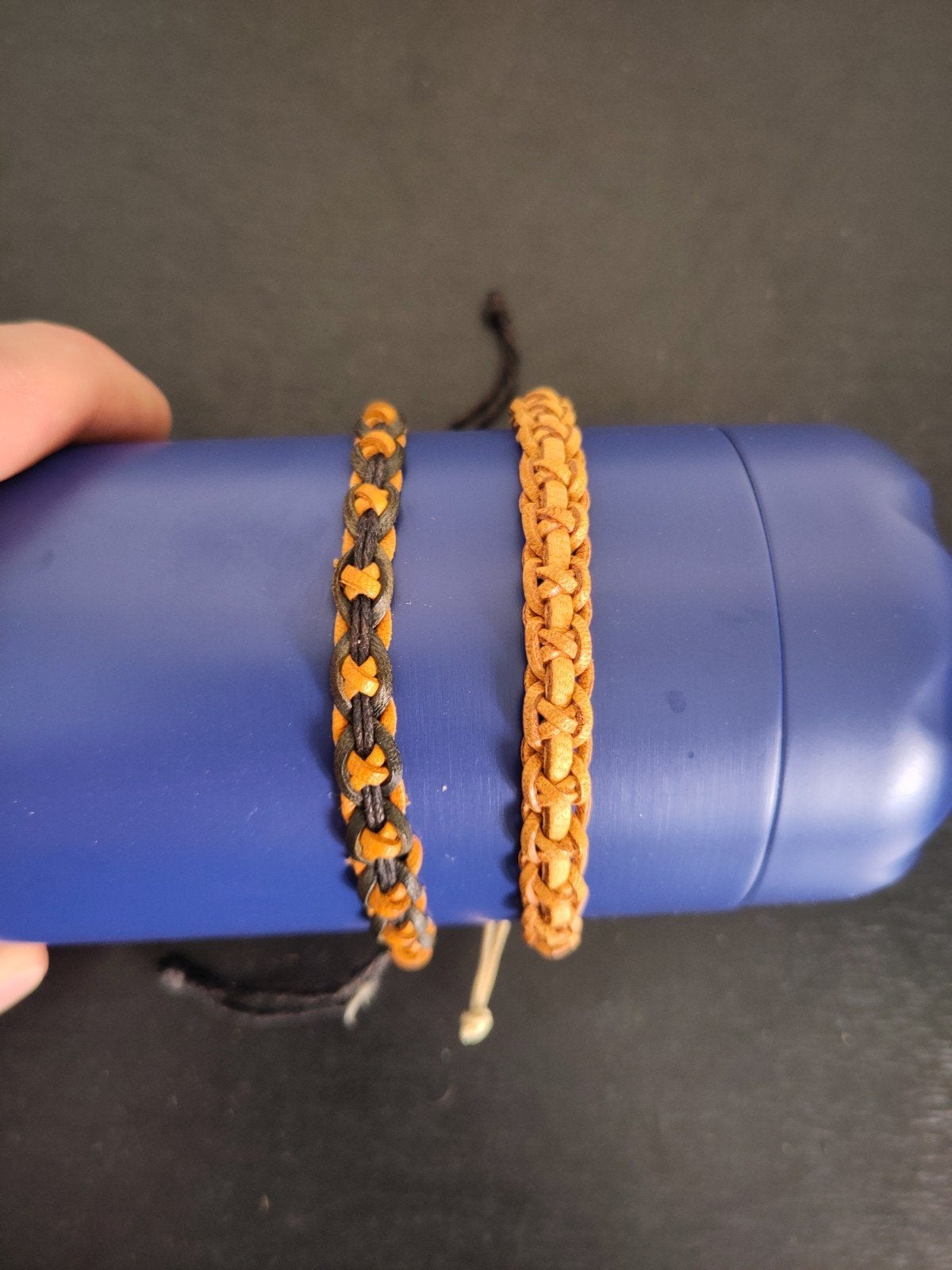 Gevlochten leren armbanden - Oranje en Zwart/Oranje, Ophalen of Verzenden, Gebruikt, Oranje, Leer