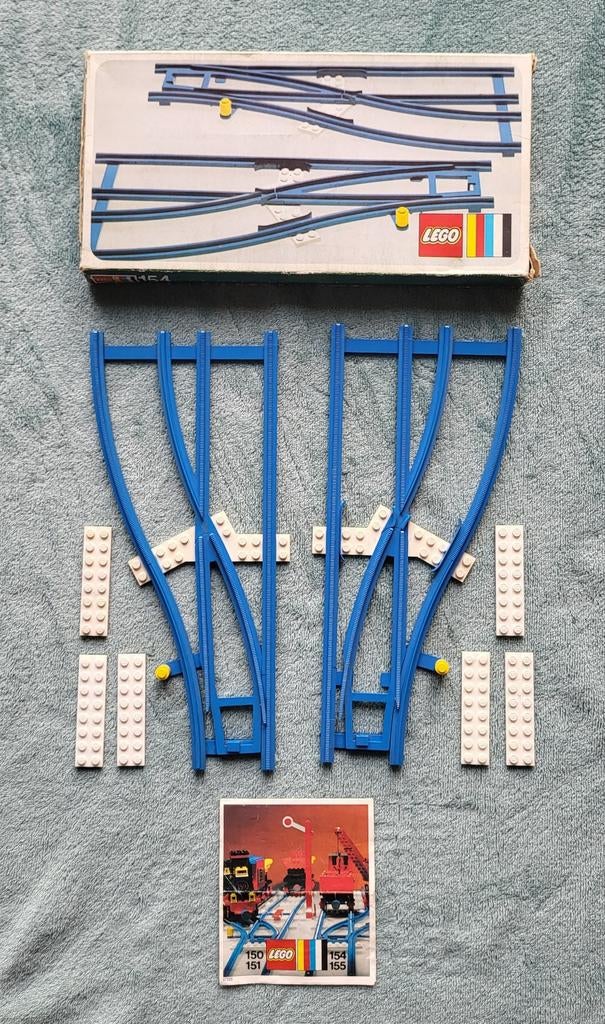 Lego trein 4,5 Volt blauwe rails wissels (set 154) + doos., Compleet, Gebruikt, Lego, Ophalen of Verzenden