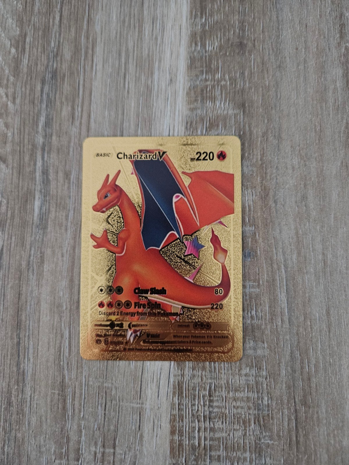 Charizard V gouden pokemon kaart, Ophalen of Verzenden, Zo goed als nieuw