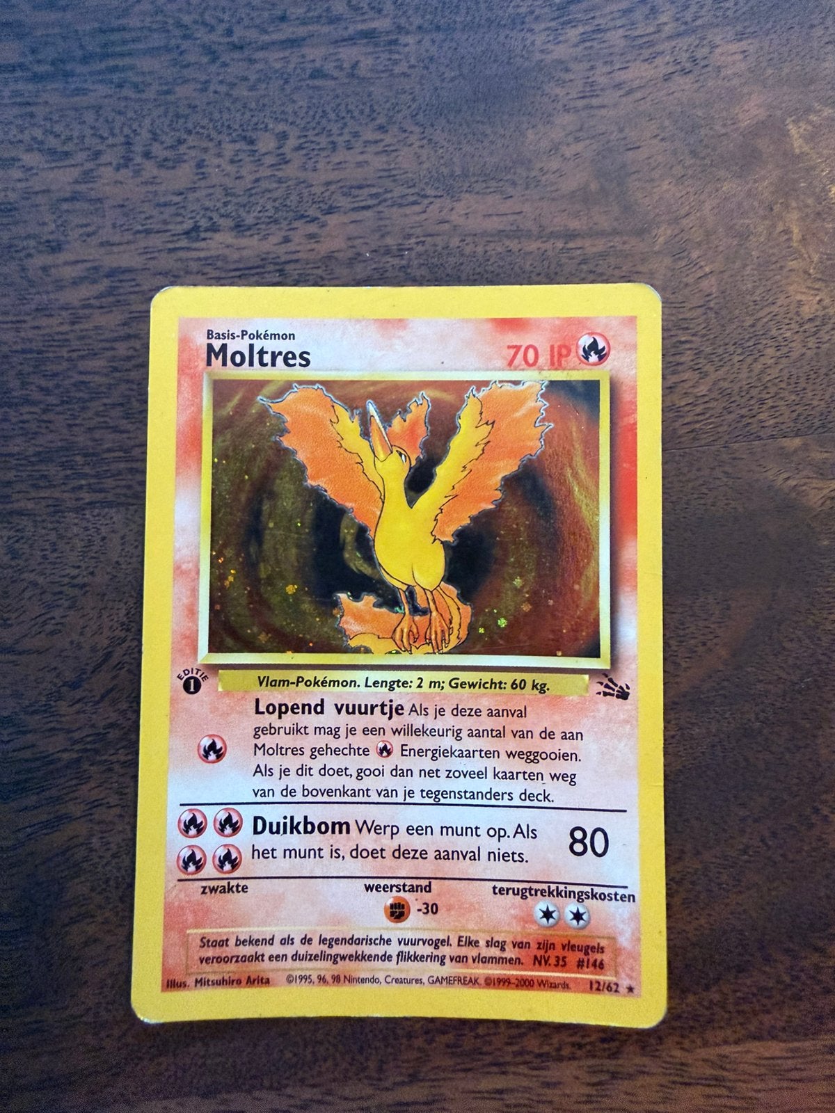 First edition Moltres pokemon kaart (NL) 12/62, Ophalen of Verzenden, Zo goed als nieuw