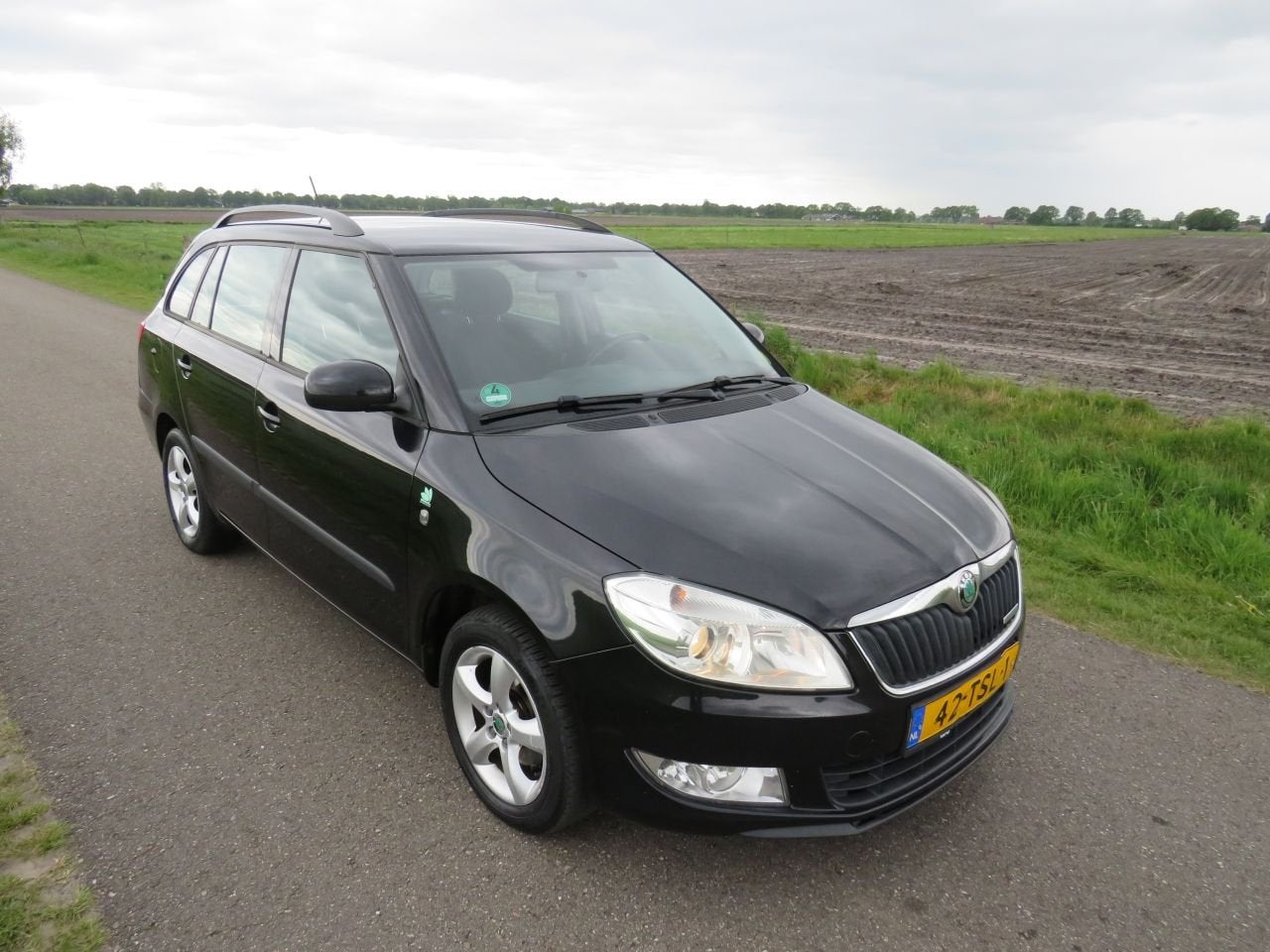 Skoda Fabia 1.2 TDi Greenline Business Line Navigatie Airco, Infoline@skoda-auto.cz, Zwart, Stationwagon, 1200 cc