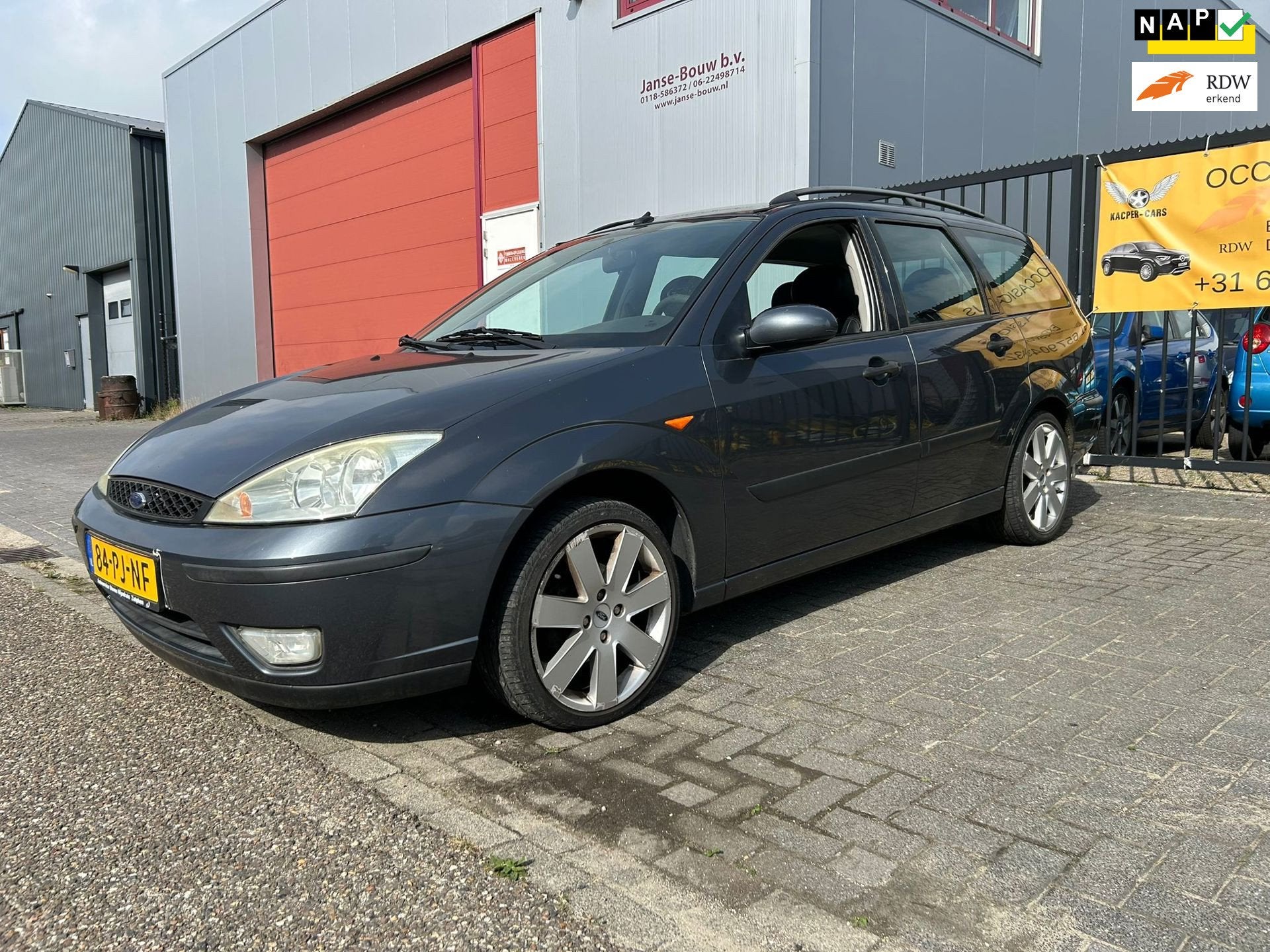 Ford Focus Wagon 1.6-16V Futura Automatische Airco/Navigatie, Auto's, 1596 cc, Gebruikt, Zwart, 4 cilinders