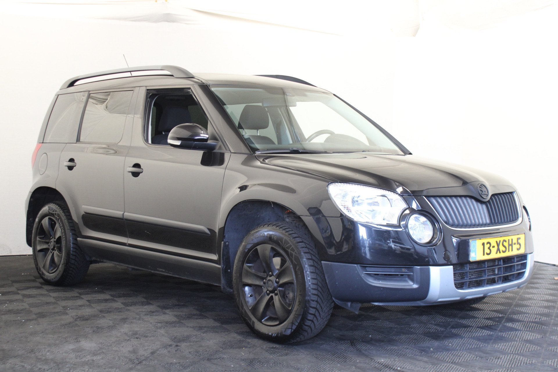Skoda Yeti 1.8 TSI Comfort 4x4 (bj 2011), Auto's, Skoda, 13 km/l, Euro 5, Stof, Zwart