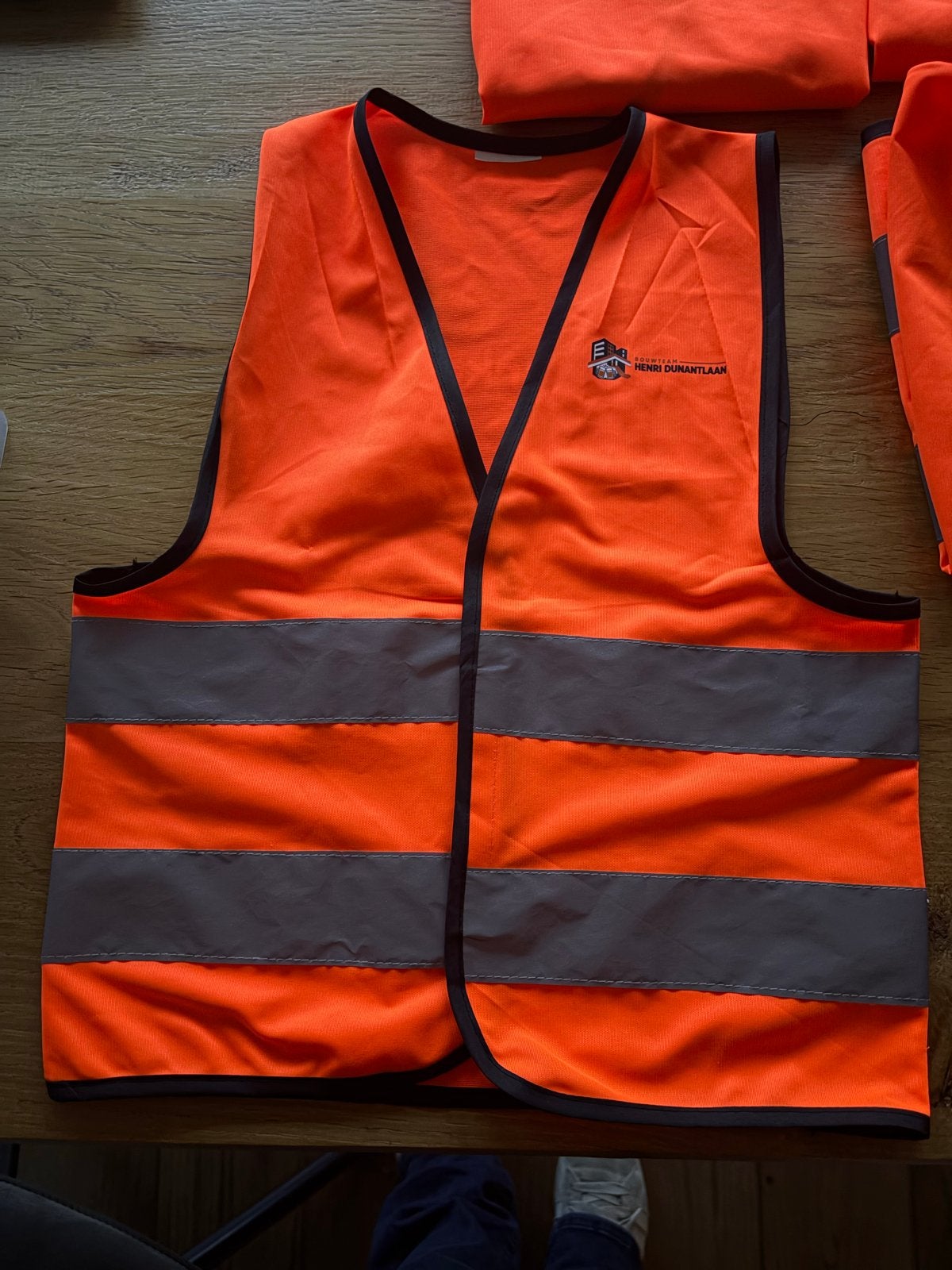 Oranje reflecterende veiligheidshesjes met ludieke tekst, Ophalen of Verzenden, Nieuw, Overige maten, Oranje of Koningsdag