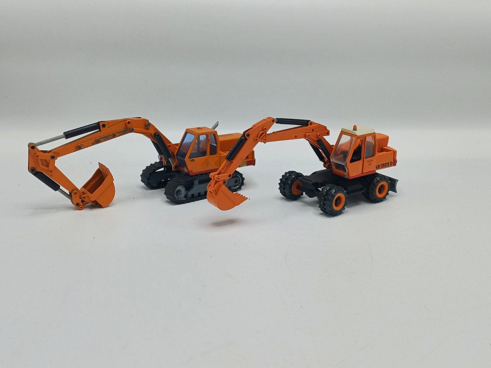 NZG Atlas AB1302 D en Atlas AB1702, Hobby en Vrije tijd, Ophalen of Verzenden, Zo goed als nieuw, Hijskraan, Tractor of Landbouw