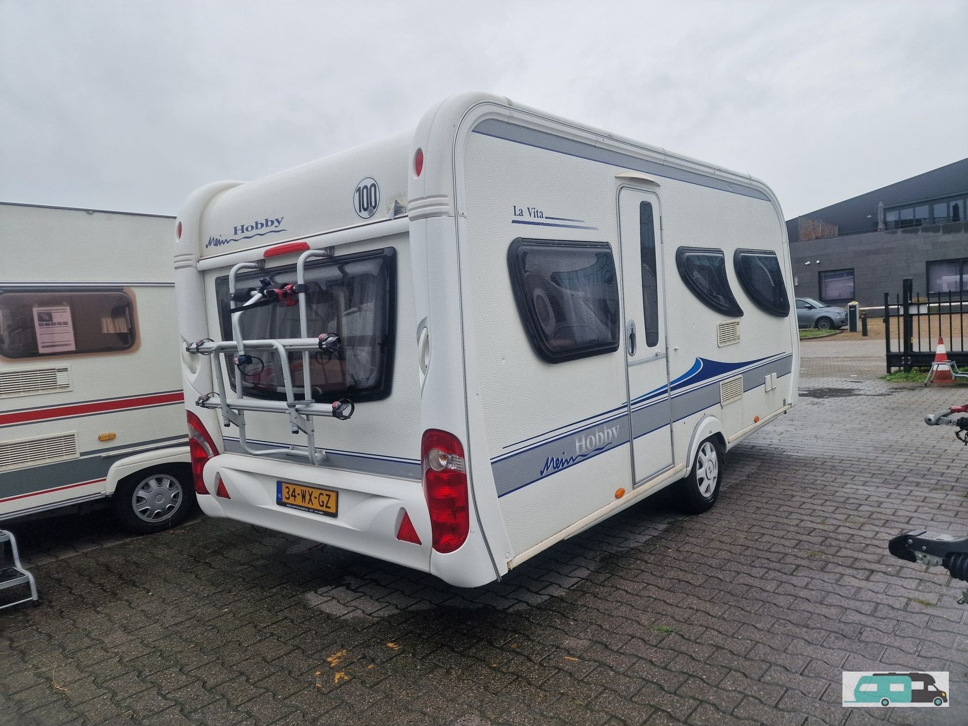 Hobby la vita 455 UF 2009 mover, luifel (bj 2009), Hobby, Reservewiel, Bedrijf, Tot en met 4