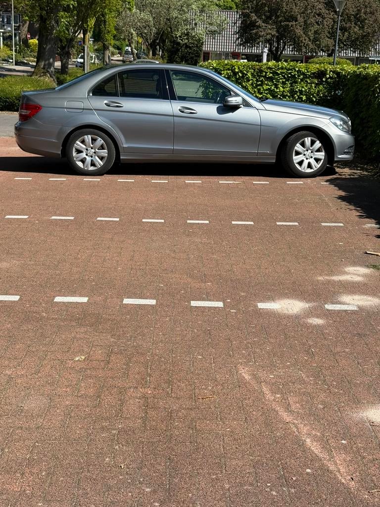 Mercedes-Benz C-Klasse 1.8 C200 Kompressor Sedan AUT 2013, Auto's, Mercedes-Benz, 15 km/l, 1800 kg, Zwart, 4 cilinders
