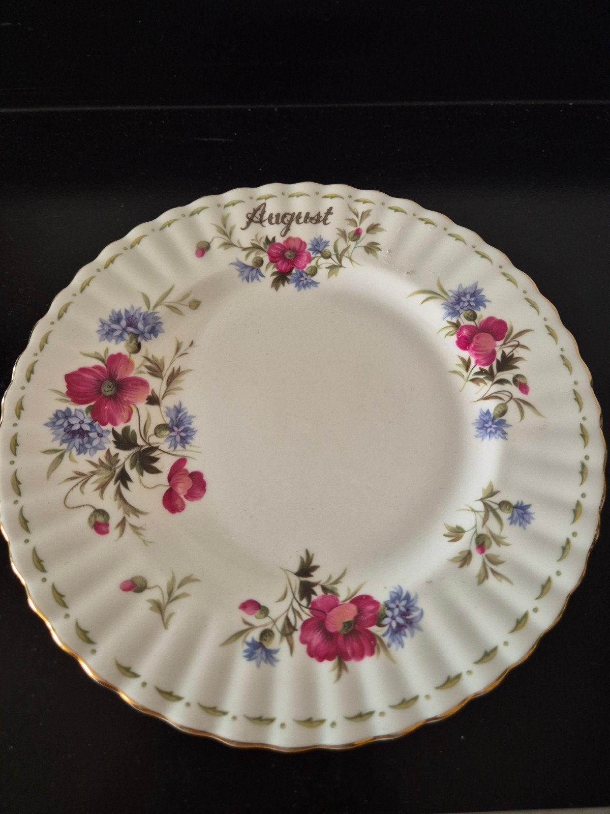 Augustus poppy porselein, Ophalen of Verzenden, Zo goed als nieuw, Porselein, Bord of Schaal