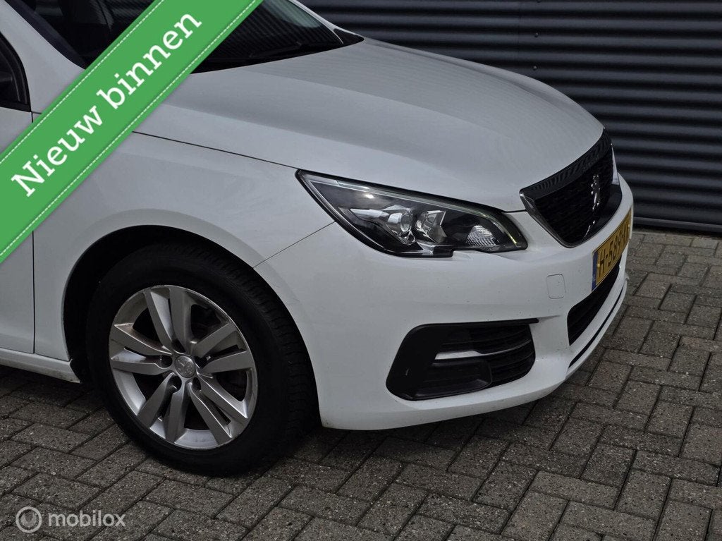 Peugeot 308 SW 1.2 PureTech Blue Lease Allure, Auto's, Voorwielaandrijving, Gebruikt, Euro 6, 1199 cc