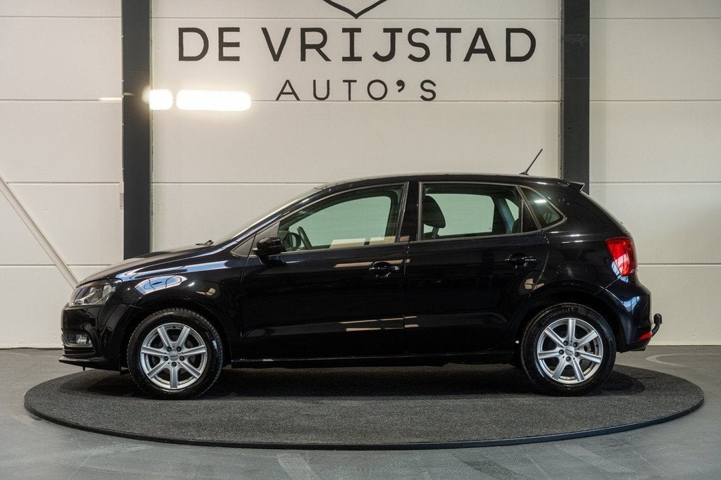 Volkswagen Polo 1.2 TSI Comfortline, Stof, 4 cilinders, Met garantie (alle), Zwart