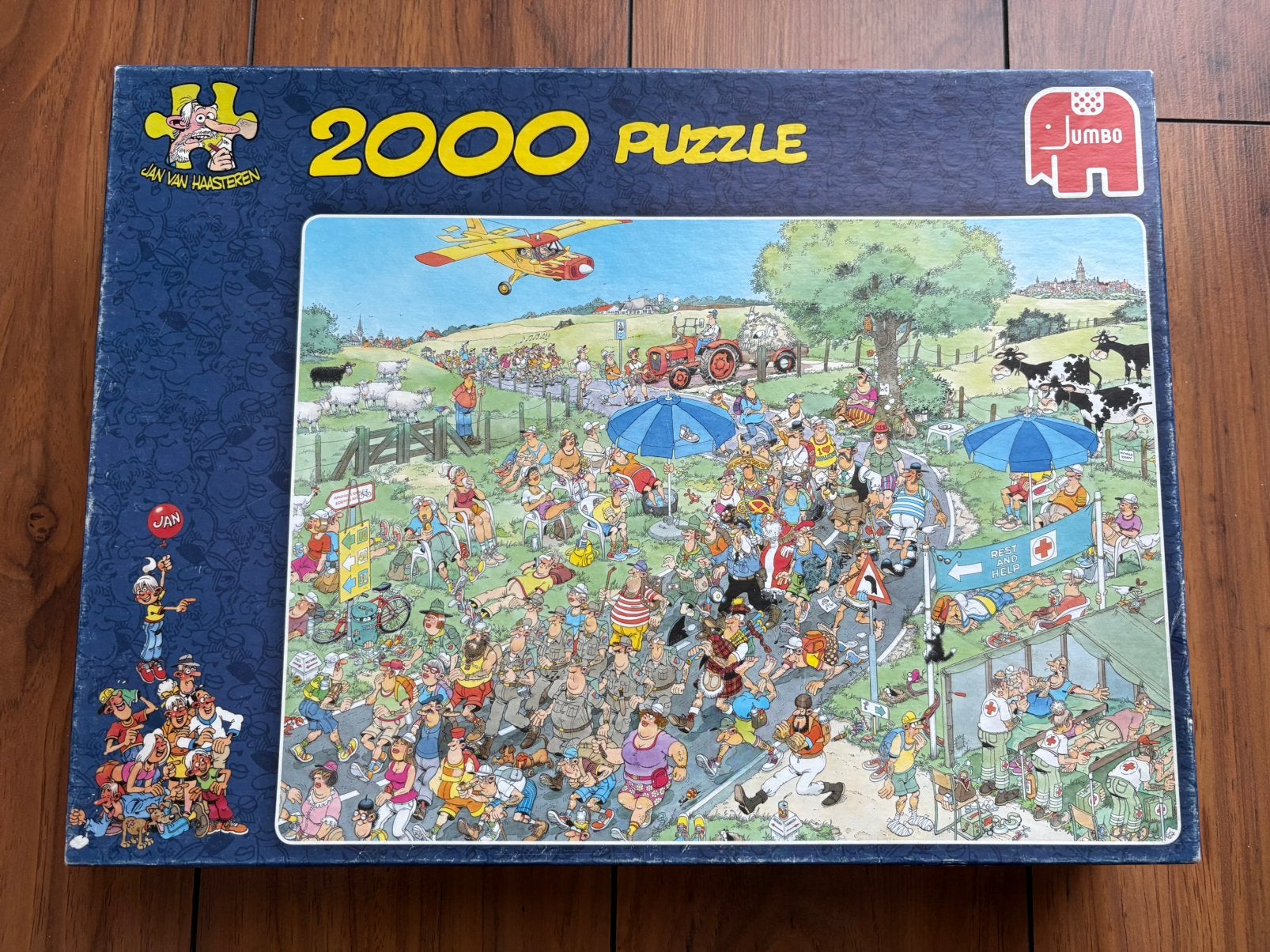 Jan van Haasteren - De Mars - 2000st, Hobby en Vrije tijd, Denksport en Puzzels, Ophalen of Verzenden, 500 t/m 1500 stukjes, Zo goed als nieuw