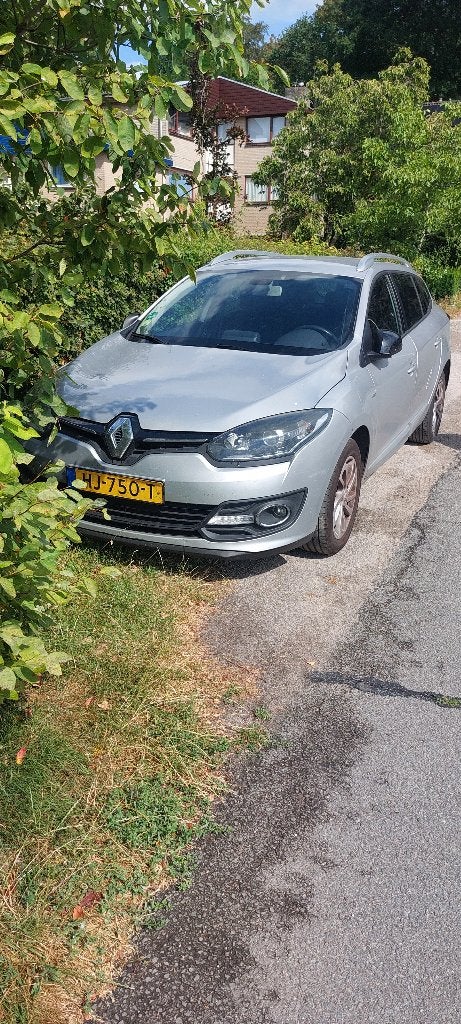 Renault Mégane 1.5 DCI 81KW Estate Bj 2015 Grijs metalic, Auto's, Electronic Stability Program (ESP), 4 cilinders, Stationwagon