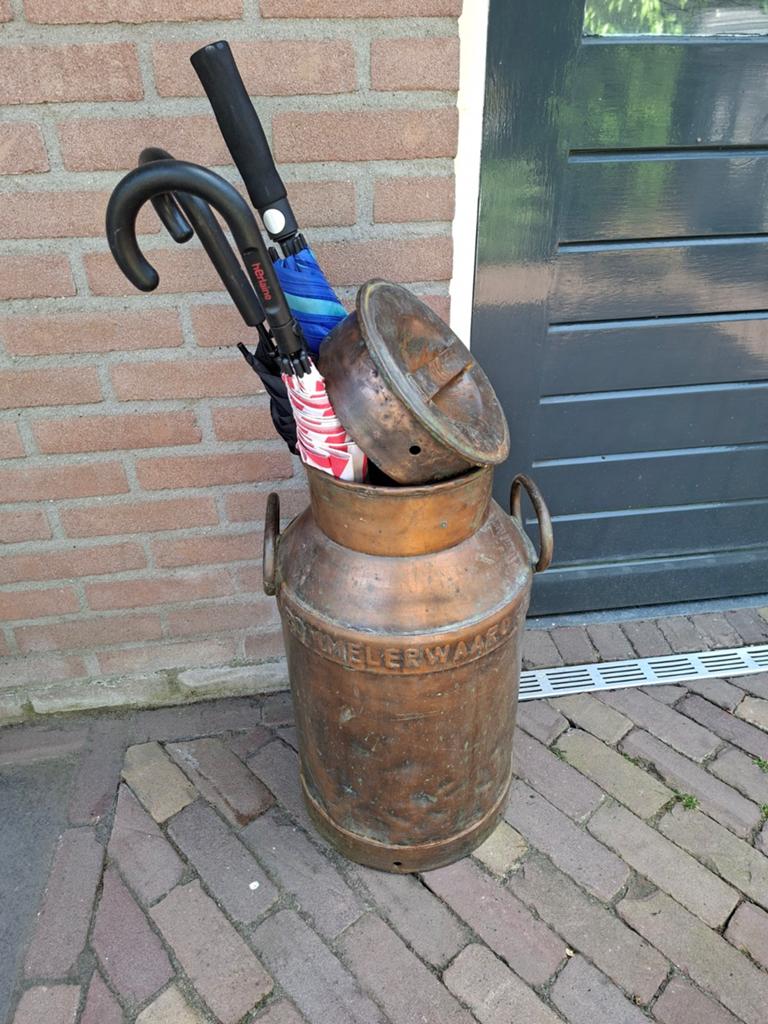 Melkbus/parapluhouder, Ophalen