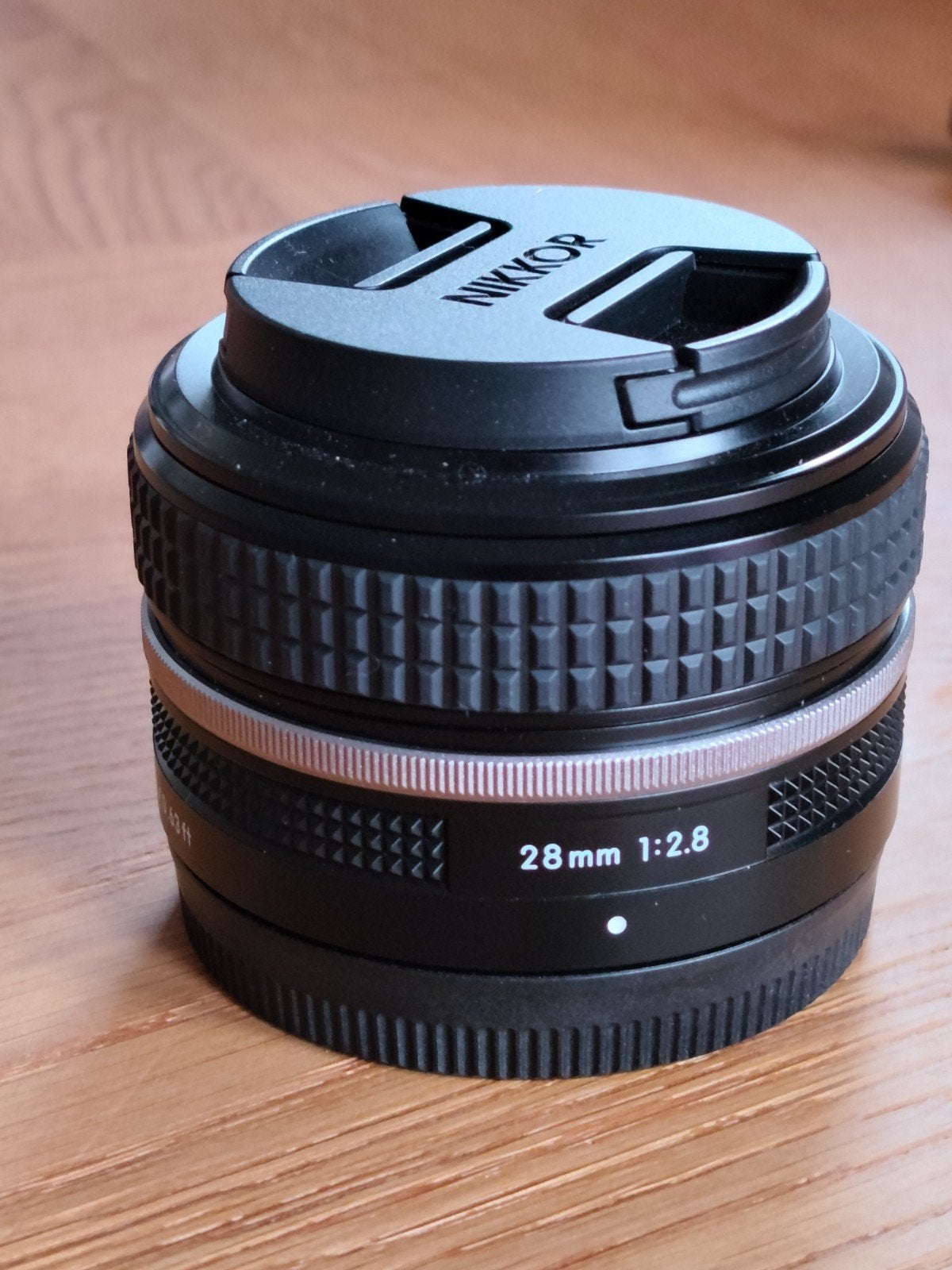 Nikon Nikkor Z 28mm f2.8 Special Edition, Nikon Z-mount, Nikon, Zo goed als nieuw, Lensdoppen