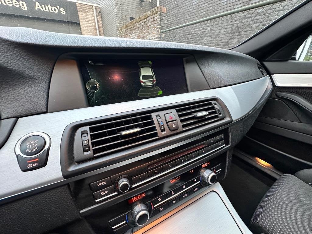 Foto 10 van BMW 5-serie Touring 520i High Executive netteauto/keurigonde