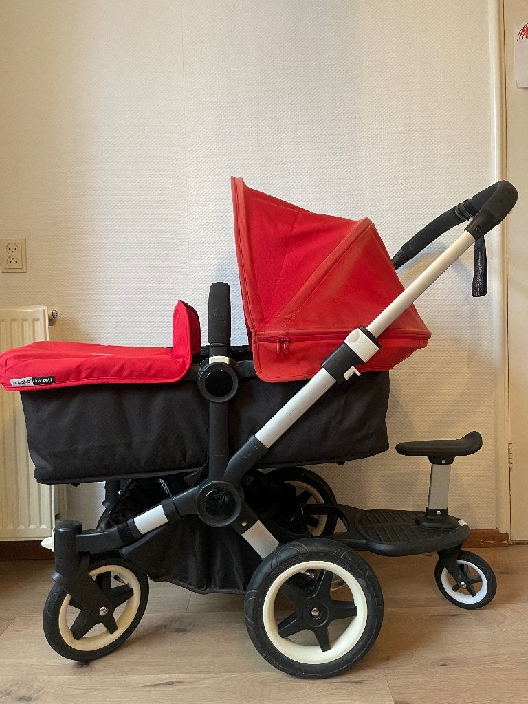 Bugaboo Donkey kinderwagen rood wandelwagen meerijdplankje, Duowagen, Gebruikt, Bugaboo, Ophalen of Verzenden