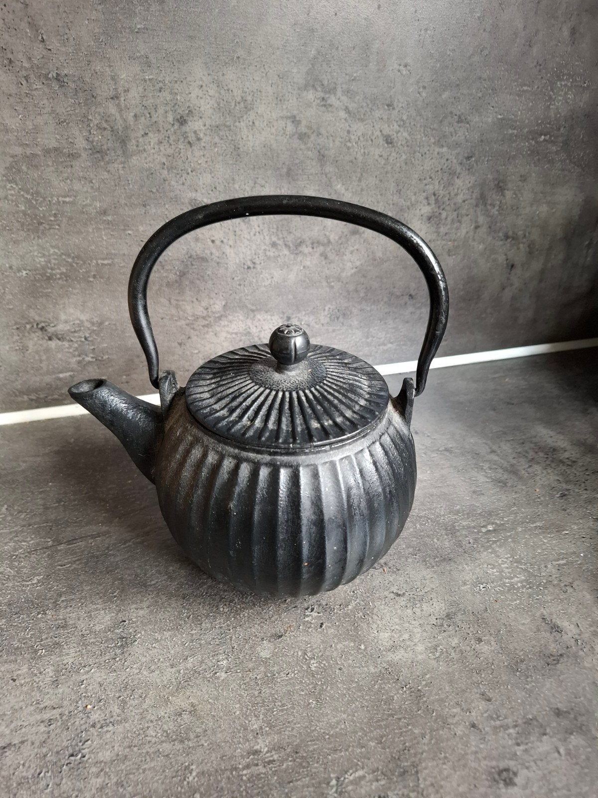 gietijzeren theepot, Ophalen, Gietijzer