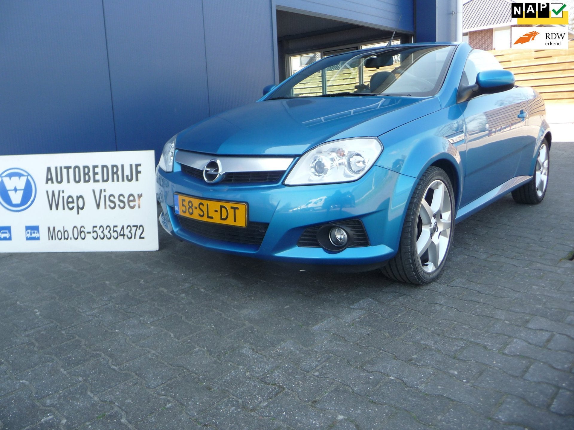 Opel Tigra TwinTop 1.8-16V Linea Rosso, Auto's, Opel, 125 pk, Gebruikt, Zwart, 4 cilinders