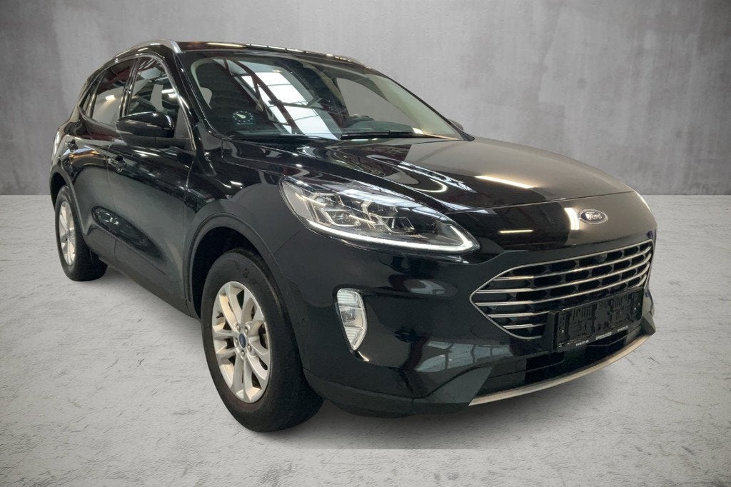 Ford Kuga 2.5 225 pk Titanium X PHEV Plug-in Hybrid Winter P, Auto's, Ford, Gebruikt, Zwart, 4 cilinders, Leder en Stof