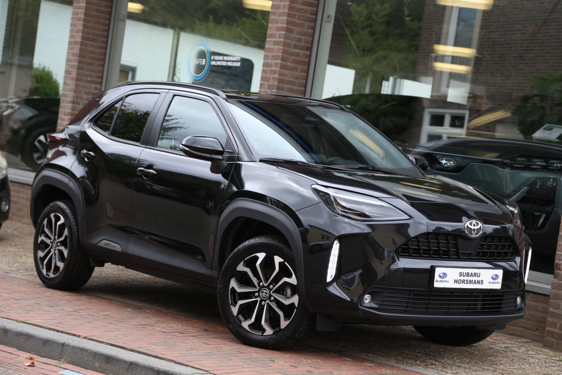 Toyota Yaris Cross 1.5 Hybrid 130 Dynamic Team Navi Camera A, Auto's, 12 maanden, Stof, Gebruikt, 1490 cc