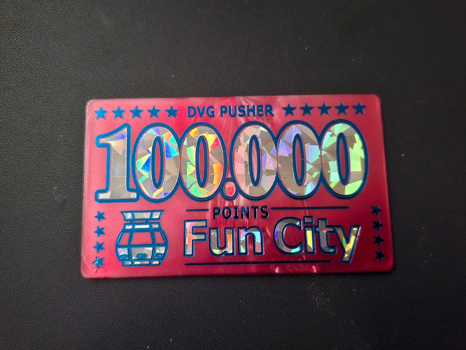 100.000 dvg coin pusher kermis penning, Ophalen of Verzenden, Overige materialen