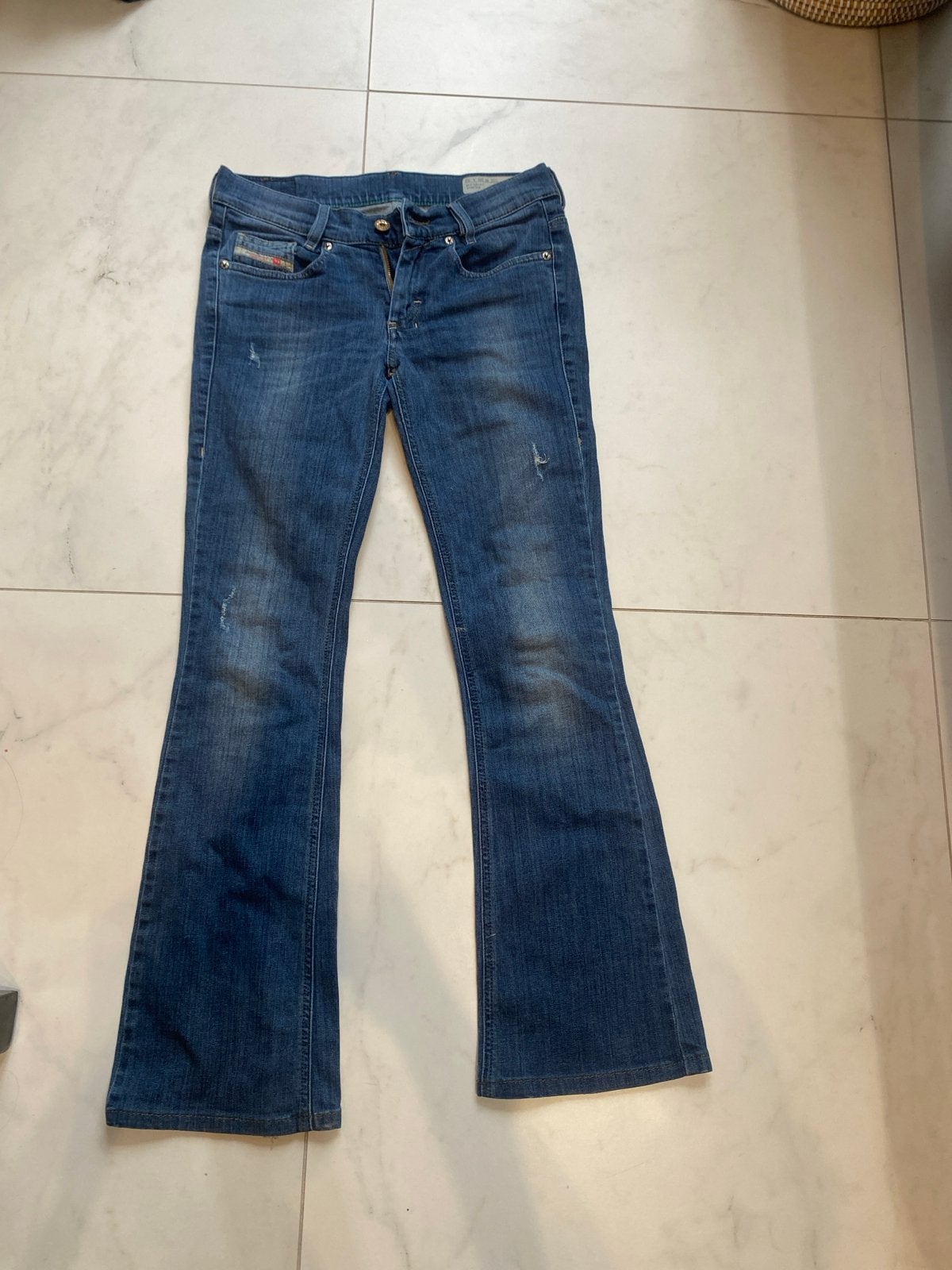 Diesel spijkerbroek bootcut blauw W28 - W29, Ophalen of Verzenden, Gedragen, Blauw, W28 - W29 (confectie 36)