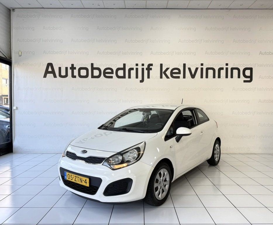 Kia Rio 1.2 CVVT Comf. Pack Bovag Garantie Airco (bj 2013), 21 km/l, Euro 5, 4 cilinders, Wit