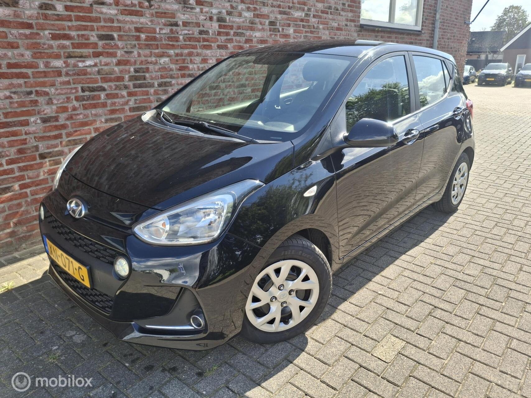 Hyundai i10 1.0i Comfort, Auto's, Gebruikt, Met garantie (alle), 4 stoelen, Zwart