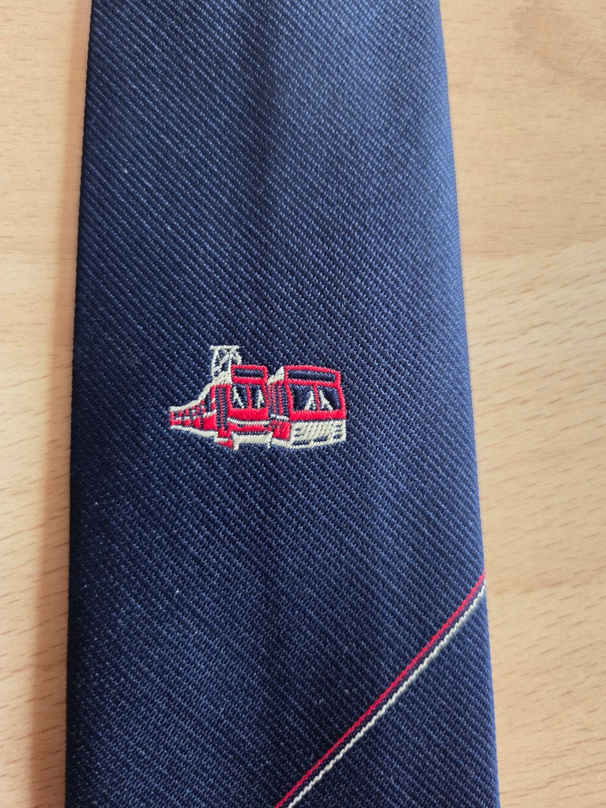 Stropdas met een bus en tram van de HTM, Kleding | Heren, Ophalen of Verzenden, Zo goed als nieuw, Blauw
