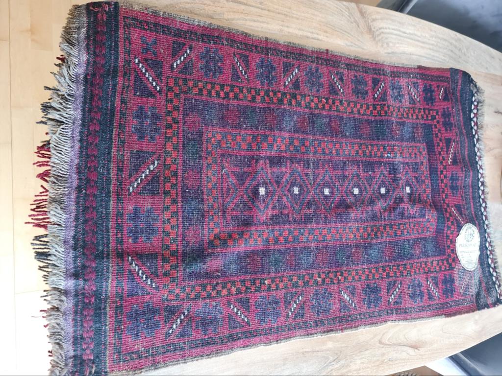 Mooi perzisch kleedje, Ophalen