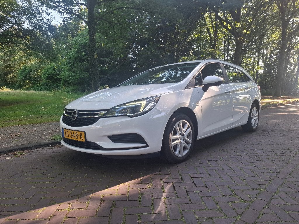 Opel Astra 1.0 Turbo 105pk Start/stop 2019 Wit, mooie auto., Auto's, Voorwielaandrijving, Stof, Euro 6, 1178 kg