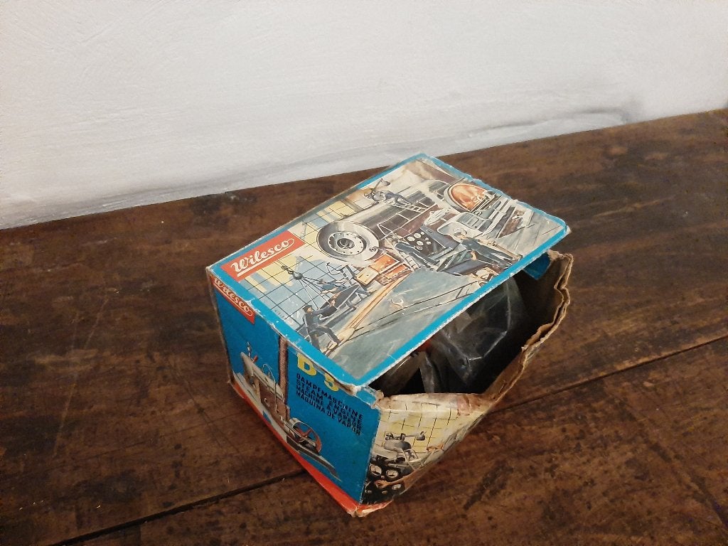 stoommachine in doos, Ophalen