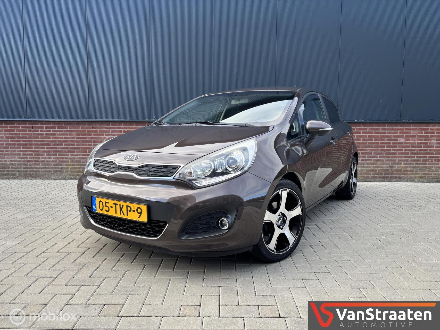 Kia Rio 1.2 CVVT Super Pack | Keyless | Nw motor + koppeling, Auto's, Euro 5, 4 cilinders, Bruin, Origineel Nederlands