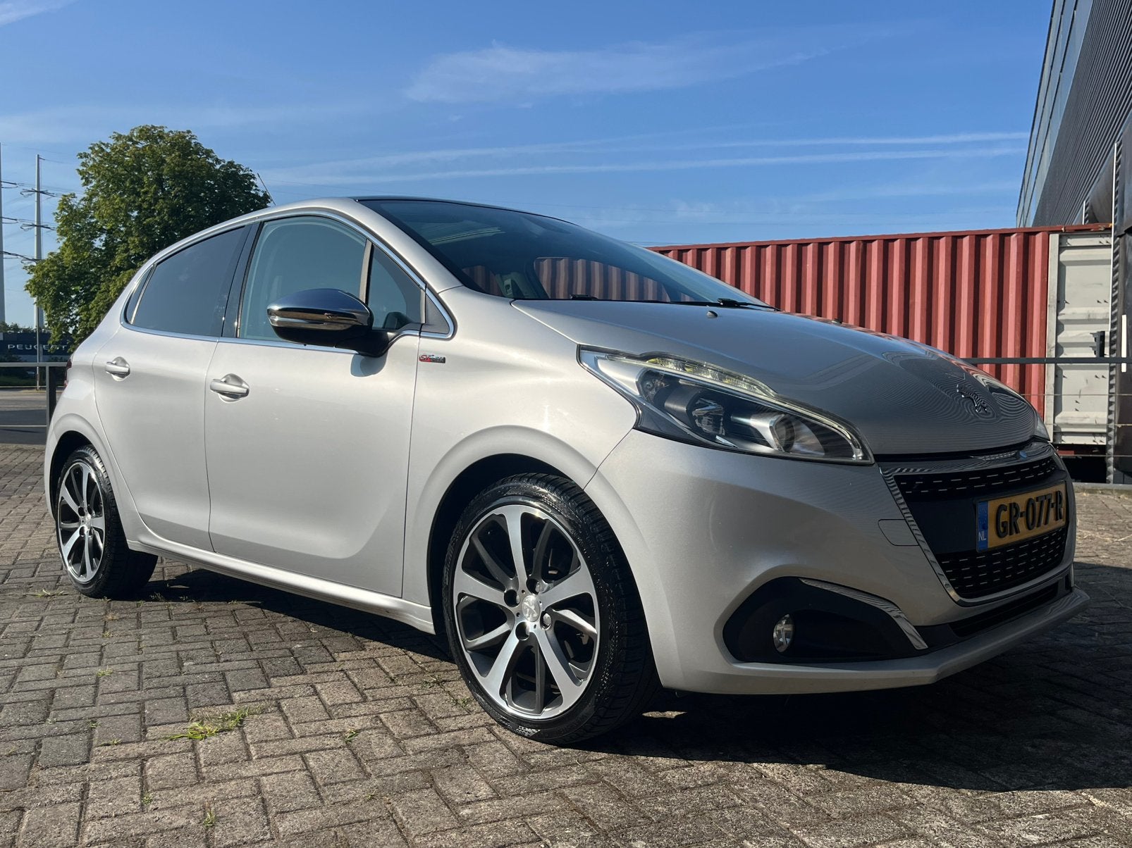 Peugeot 208 1.2 GT line | D-riem vv. | pano |navi, Auto's, Voorwielaandrijving, Zwart, Leder en Stof, Handgeschakeld