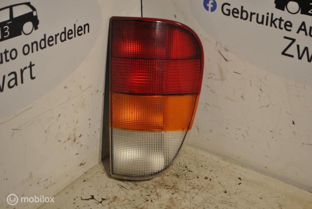 Achterlicht R Vv Caddy Bestel II 1.9 TDI W06K9945096, Gebruikt, Volkswagen, Ophalen of Verzenden
