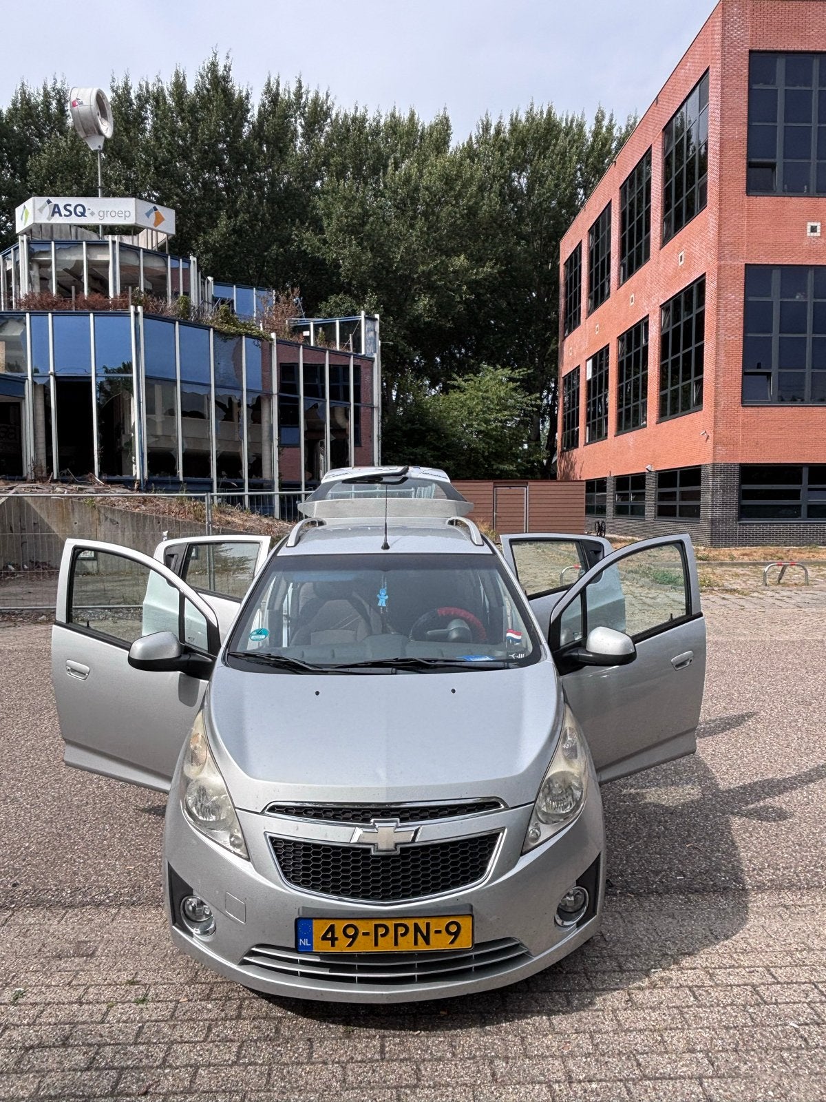 Chevrolet Spark 1.0 Bifuel 2011 Grijs LPG/Benzine, Auto's, 15 km/l, 37 €/maand, 4 cilinders, Origineel Nederlands