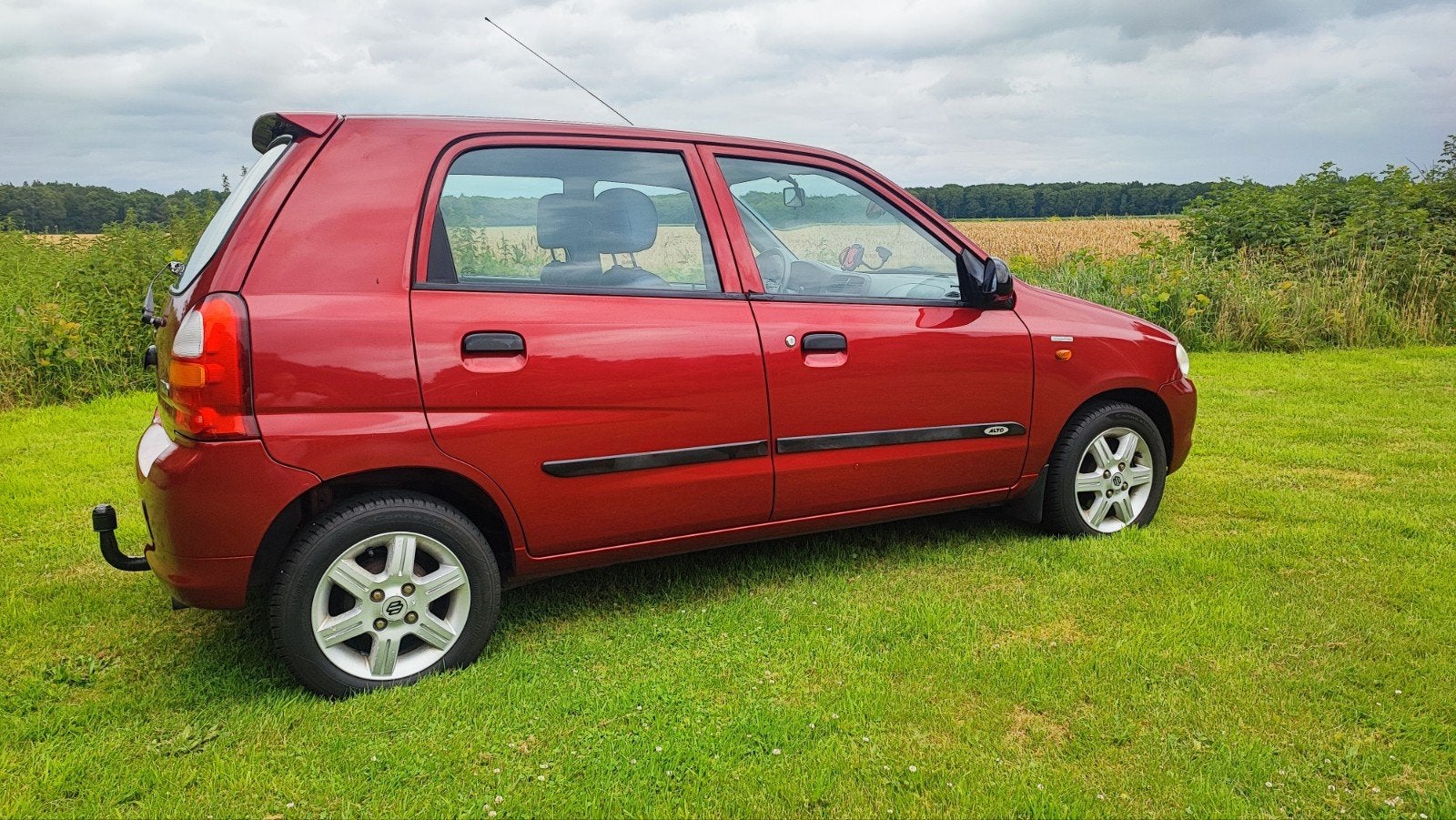 Suzuki Alto 1.1 16V 5d AGS 2003 Rood, Auto's, Suzuki, 750 kg, 4 cilinders, 4 stoelen, Origineel Nederlands