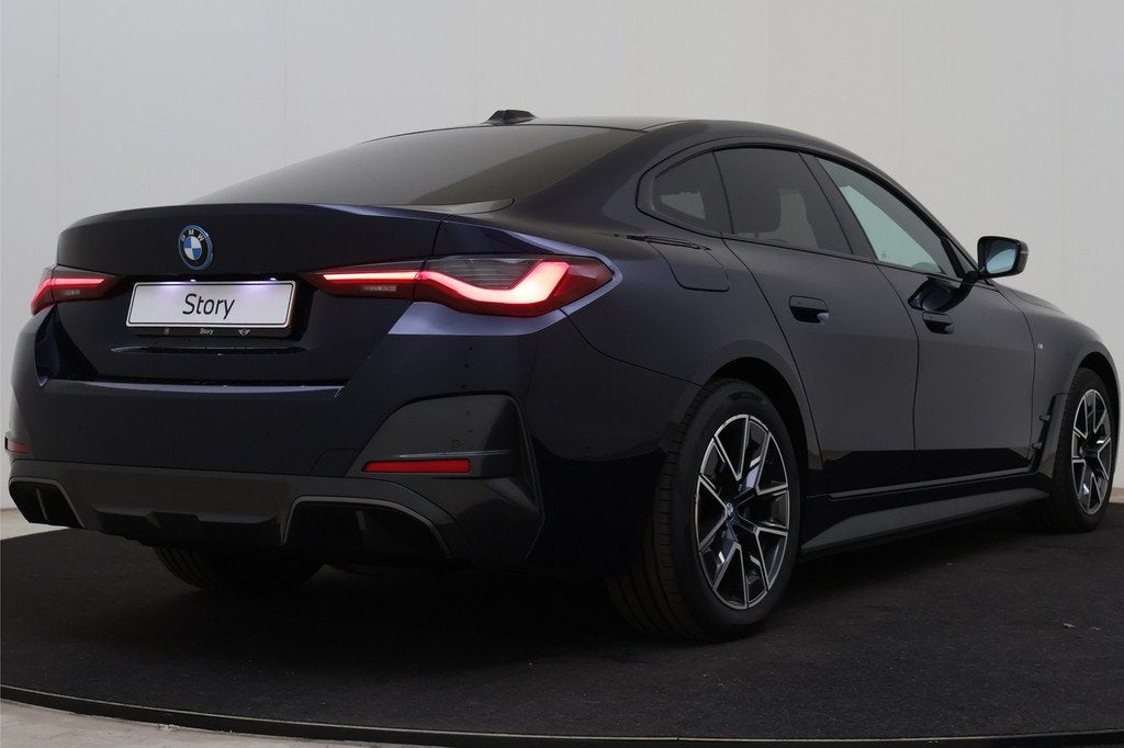 BMW i4 eDrive40 High Executive M Sport / Comfort Access / Ac, Auto's, BMW, Achterwielaandrijving, Gebruikt, 590 km, Met garantie (alle)