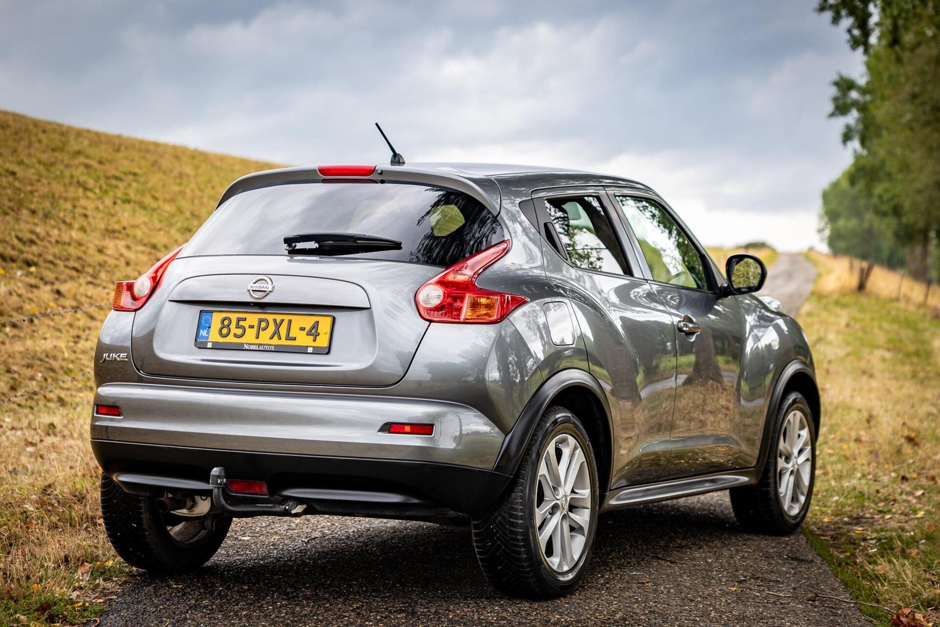 Nissan Juke 1.6 Acenta|Nap|Camera|Trekhaak|Stoelverwarming, Euro 5, 4 cilinders, Met garantie (alle), 49 €/maand