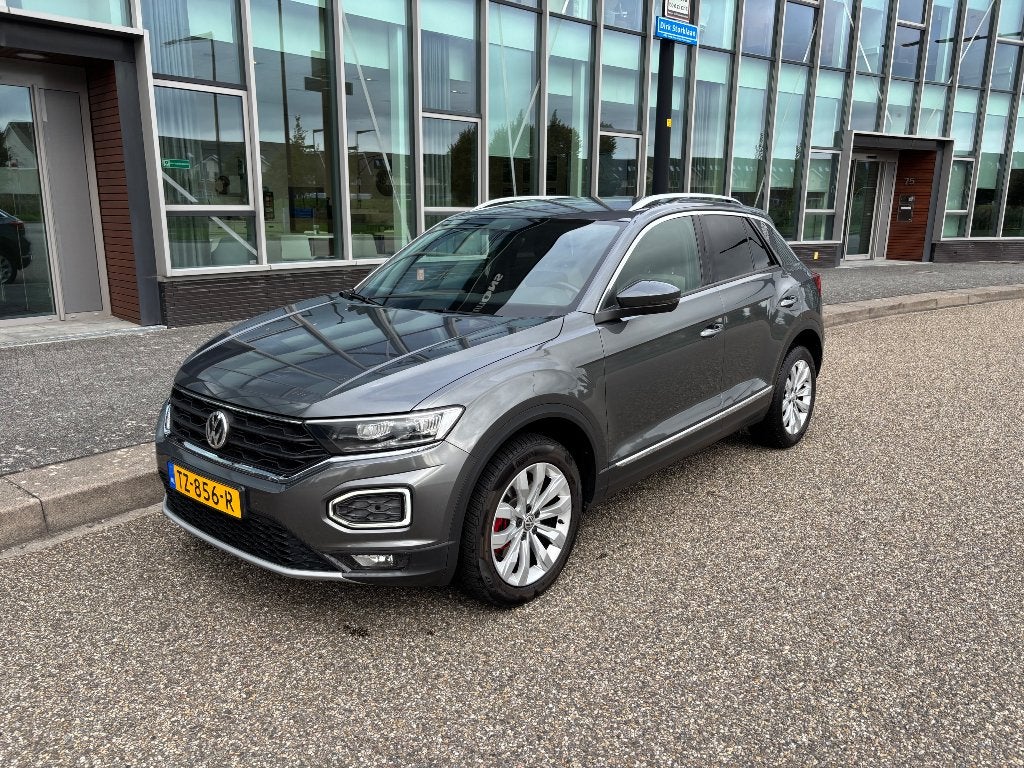 Volkswagen T-Roc TSI Sport 115pk Grijs APK Nov 2027, Voorwielaandrijving, Zwart, Leder en Stof, Origineel Nederlands