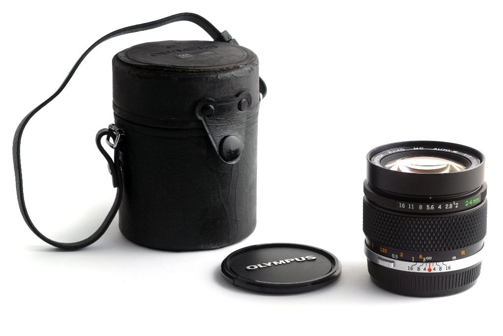 Olympus 24mm 2.0 OM Zuiko Nieuwstaat 1 jaar garantie, T, Zo goed als nieuw, N, V