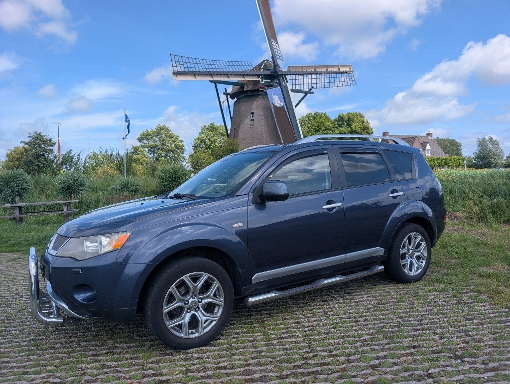 Mitsubishi Outlander 2.4 Intense+ 7zits,Leder,Carplay,Camera, Auto's, Mitsubishi, Lichtsensor, Outlander, Zwart, 4 cilinders