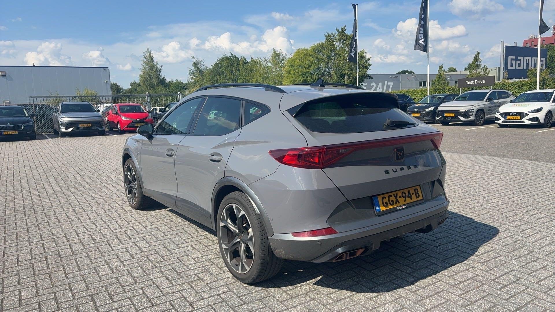 CUPRA Formentor 1.4 e-Hybrid Business 204 PK | Automaat | Ap, Auto's, 12 maanden, Stof, Gebruikt, 4 cilinders