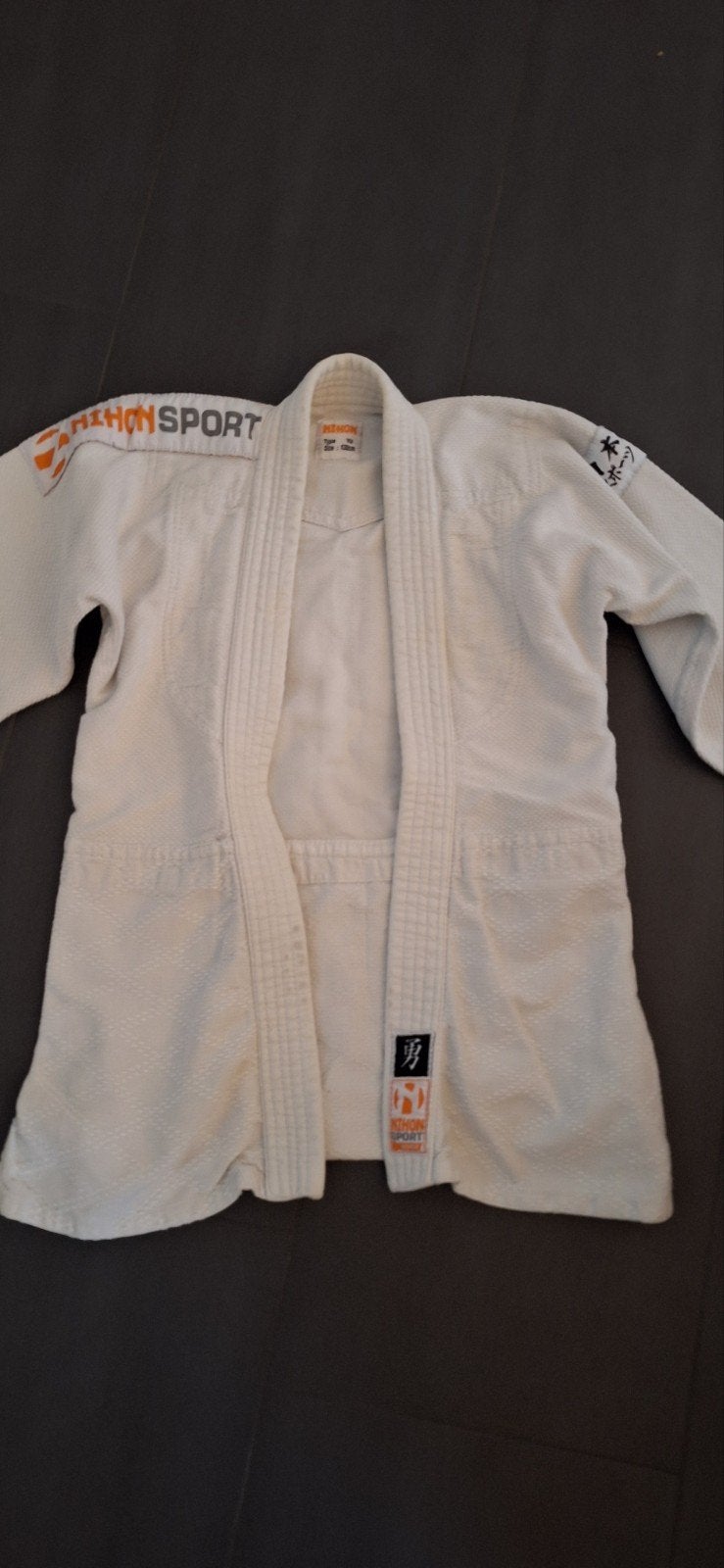 Judo jas Nihon Sport maat 130, Gebruikt, Maat XS of kleiner, Judo, Ophalen of Verzenden