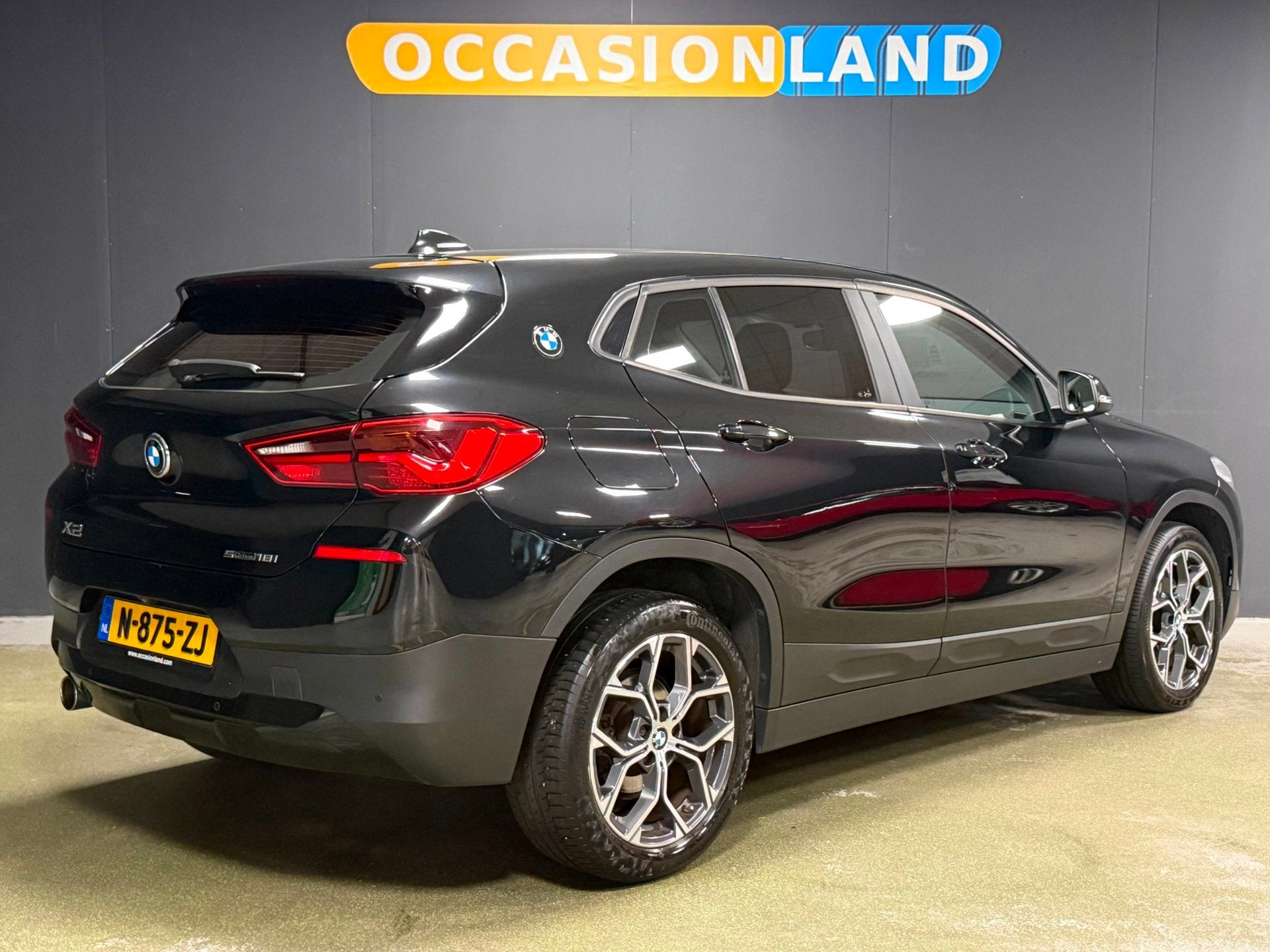 BMW X2 SDrive18i Executive|CAMERA|BLUETOOTH|STOELV|PDC|18INC, Auto's, Dealer onderhouden, Gebruikt, Zwart, Parkeerassistent